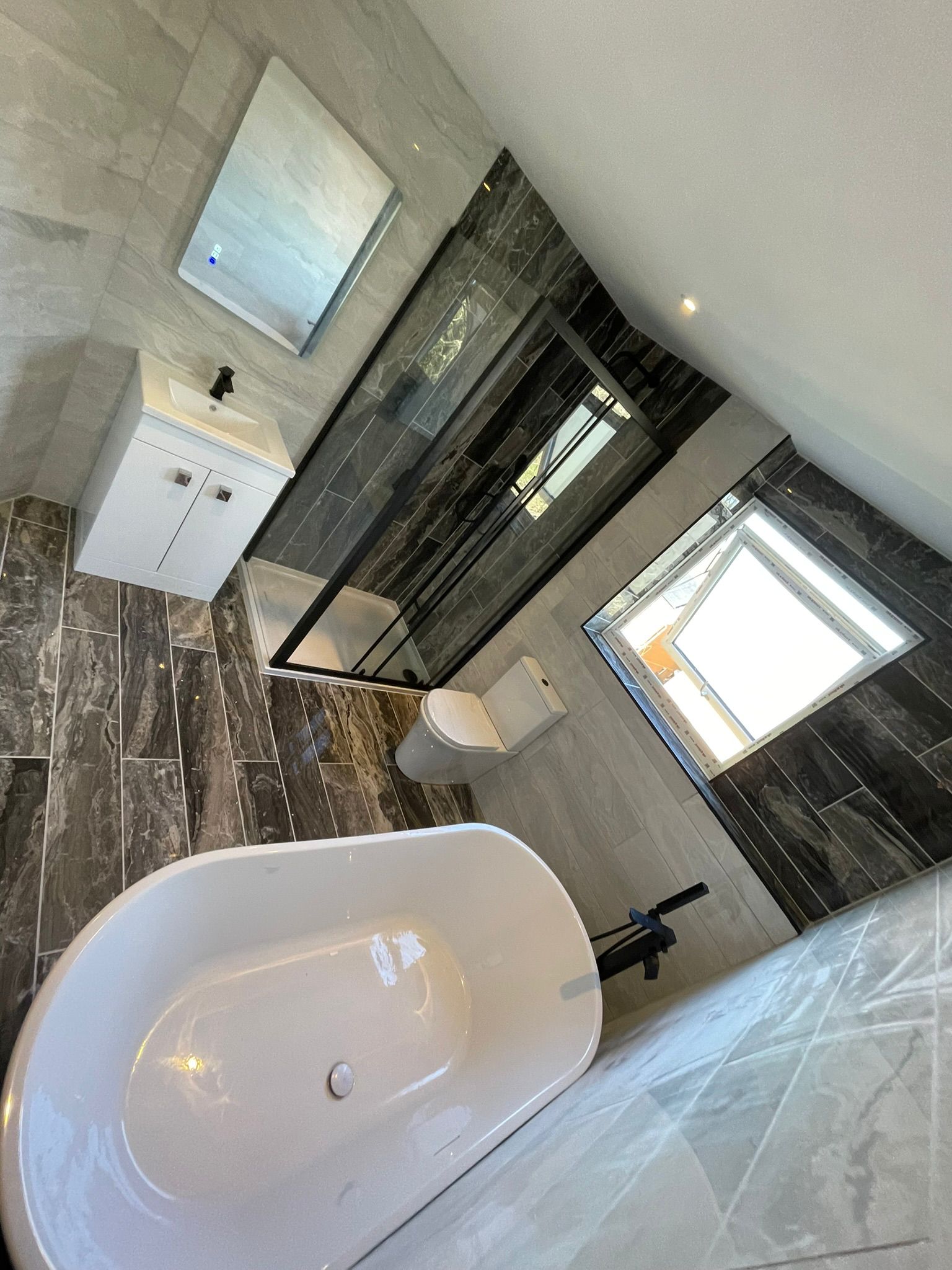 Luxury bathroom with freestanding bath and walk-in shower