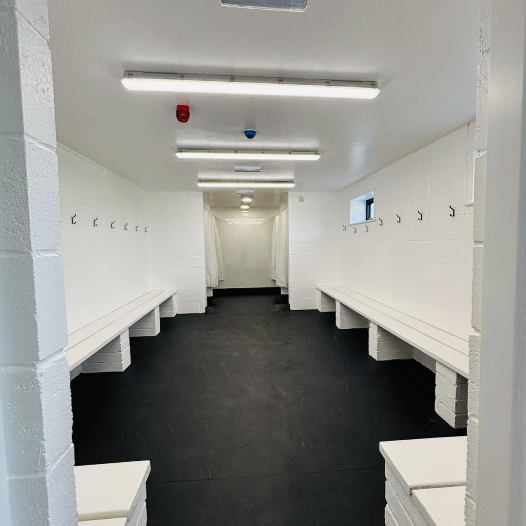 Afan United changing room with benches and hooks