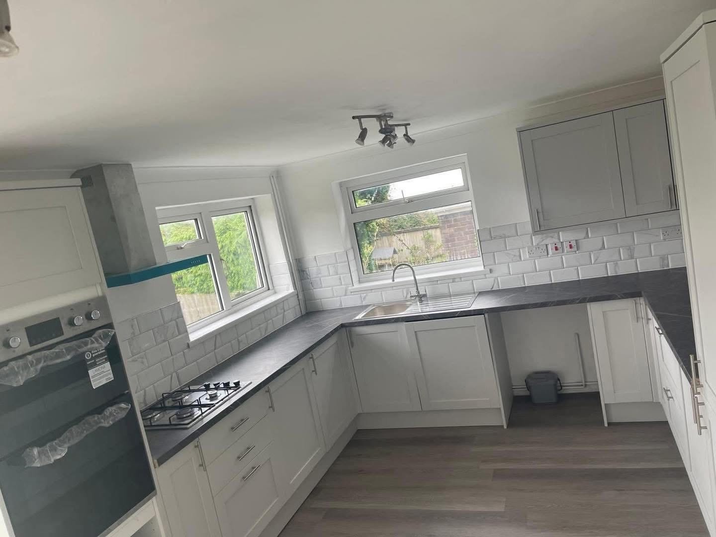 Kitchen plumbing with gas hob and sink installation